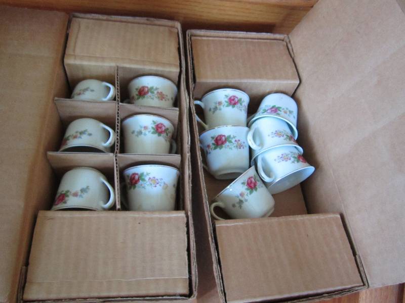2 sets of tea cups and matching sau...