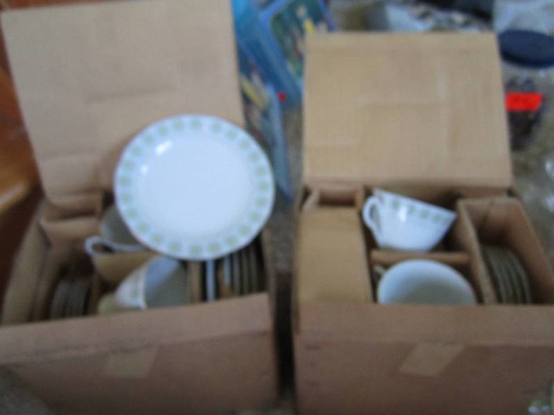 2 matching sets of tea cups and sau...
