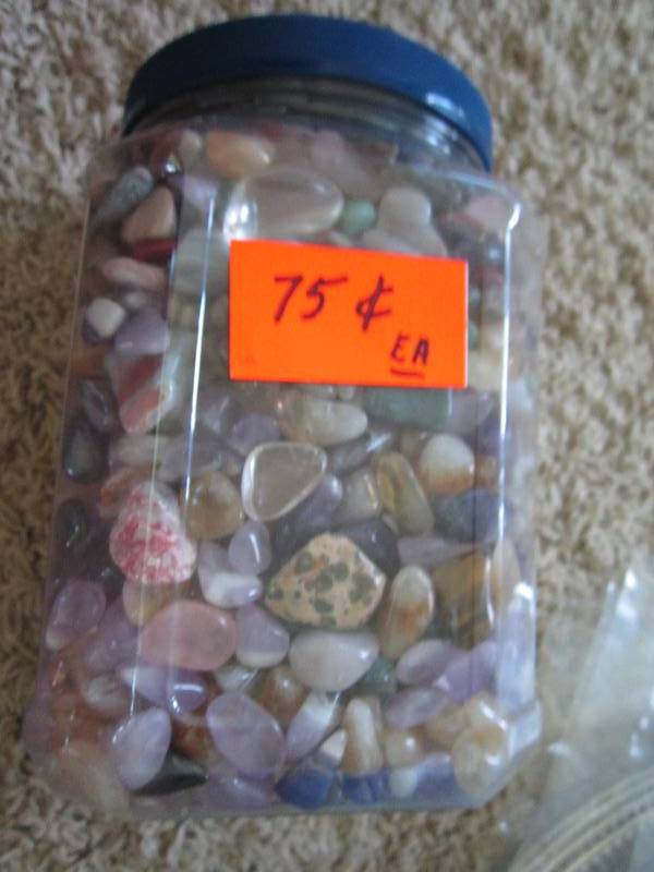 Plastic container of rocks, stones ...