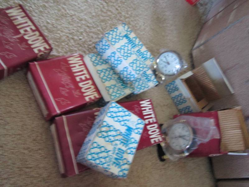 Lot of White Done alarm clocks...