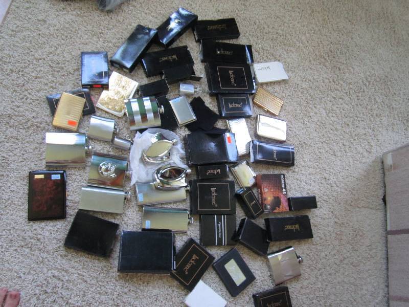Lot of Lucienne flasks and wallets...