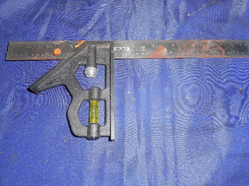 RULER WITH LEVEL ATTACHMENT