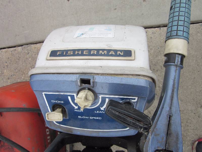 lot 10 image: Evinrude Fisherman 6 hp Motor and gas tank