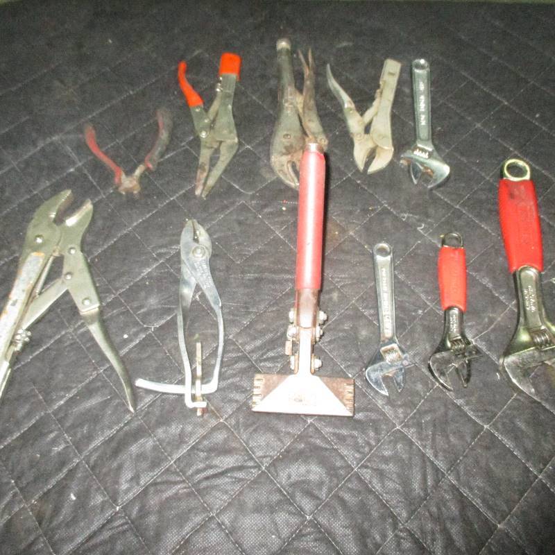 ASSORTED PLYERS AND AJUSTABLE WRENCHES