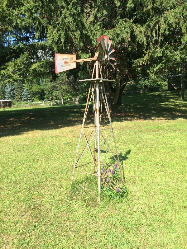 Operable Windmill   Stands approx,. 95 tall    Bring your own help for removal and loading