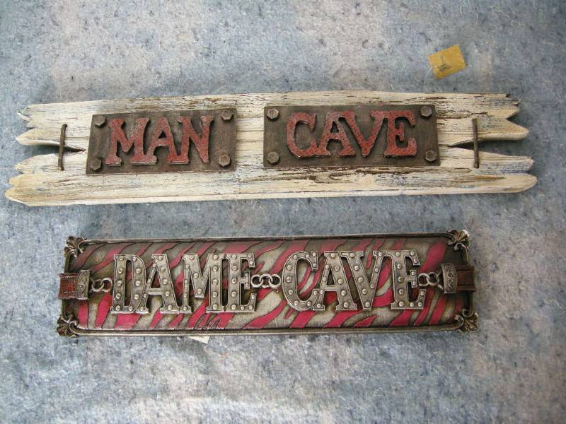 lot 19 image: Man Cave and Dame Cave Signs