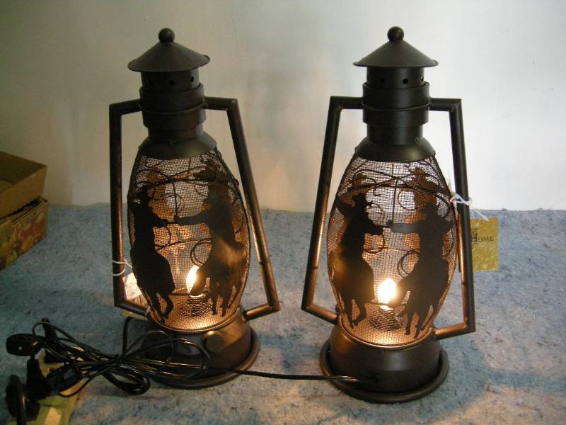 lot 36 image: 2 Cowboy Lantern Lamps