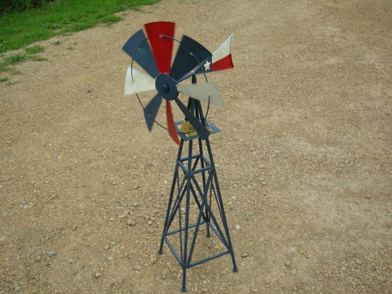 lot 72 image: Red White Blue Metal Windmill