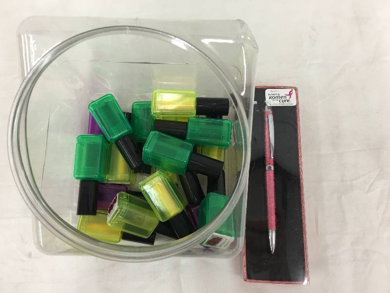 lot 17 image: nail polish highlighters and a susan g komen pen