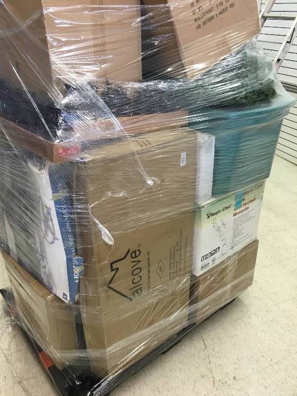 lot 137 image: pallet of new christmas items trees,wreaths decorations and more over $800 in value