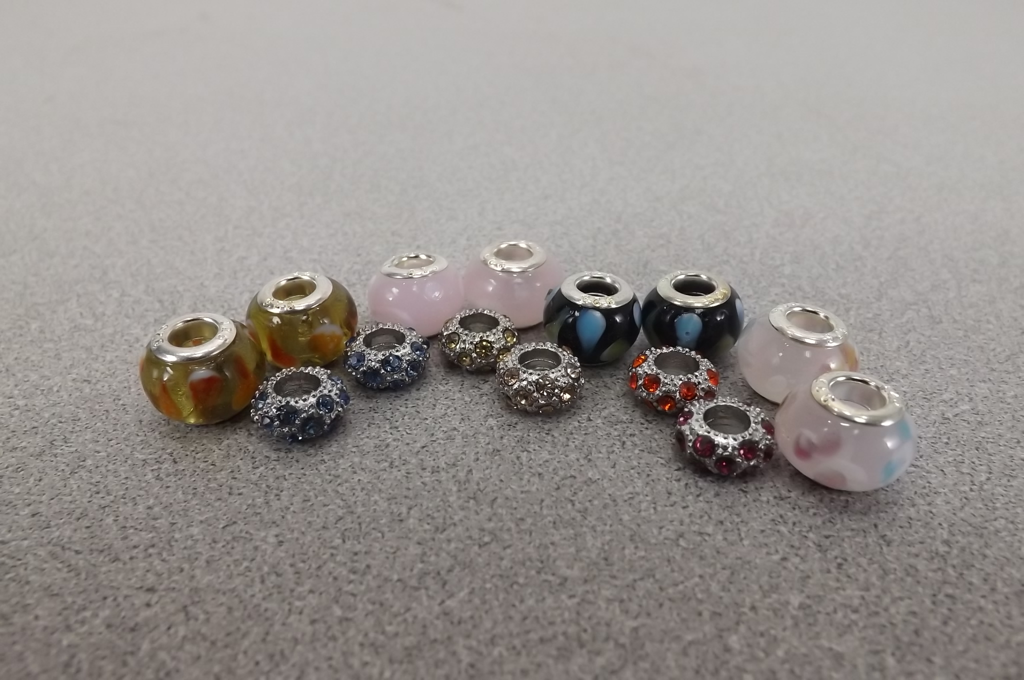 lot 15 image: Lot of .925 Sterling etc. Glass, etc, Charm Bracelet Beads