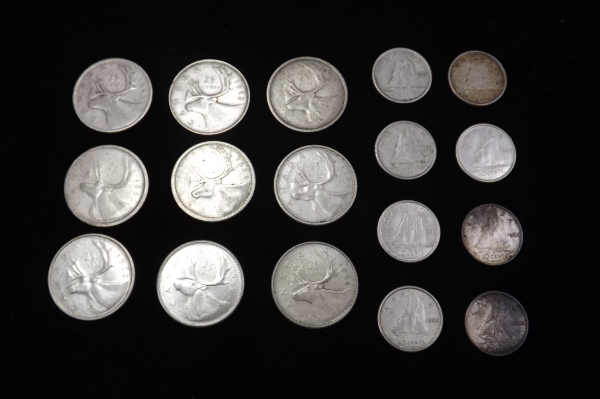 lot 22 image: 9 Canadian Silver Quarters and 8 Canada Silver Dimes
