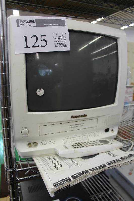 lot 125 image: Panasonic FM Radio Omnivision VHS Combination VCR Player w Remote