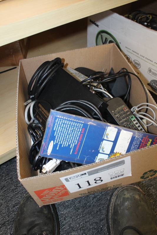 lot 118 image: Box Lot of Electronics Including Waav Airbox CM3 Mobile Internet Box, Remotes, Cordless Phones, Associated Cables