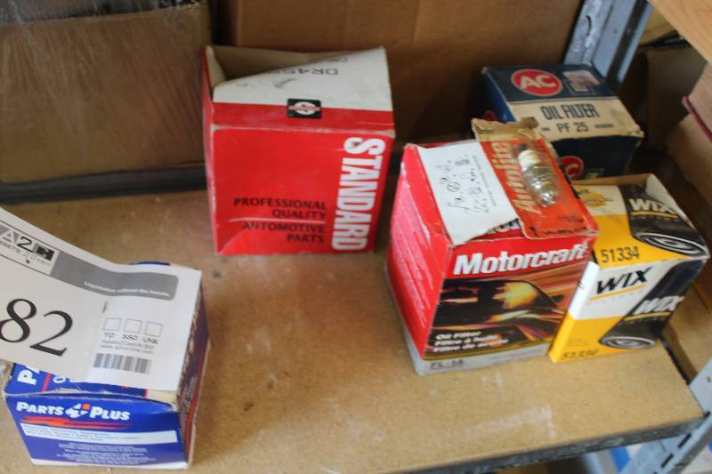 lot 182 image: Lot of (2) Boxes of Automotive Parts Including Oil Filters, Spark Plugs