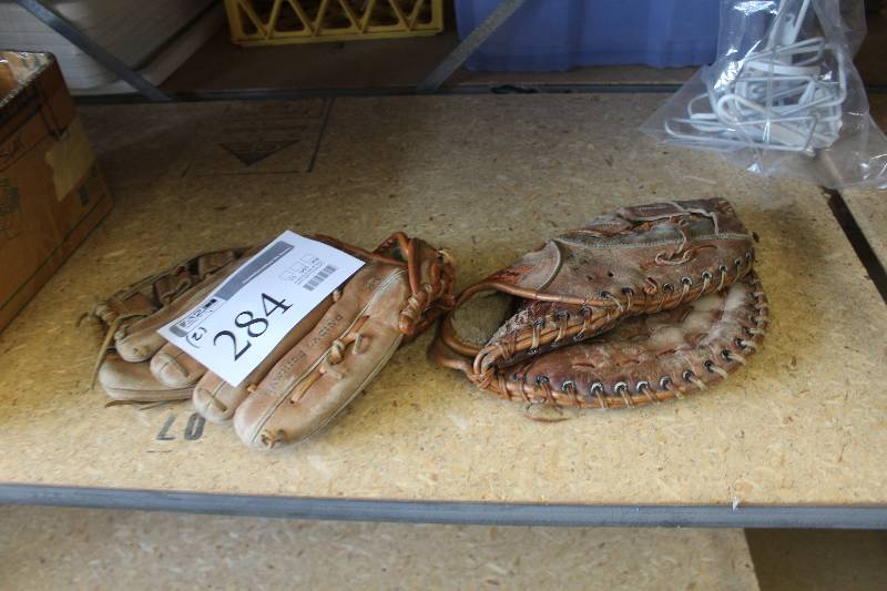 lot 284 image: Lot of (2) Baseball Gloves Including First Base Mitt, Louisville Slugger Fielders Glove