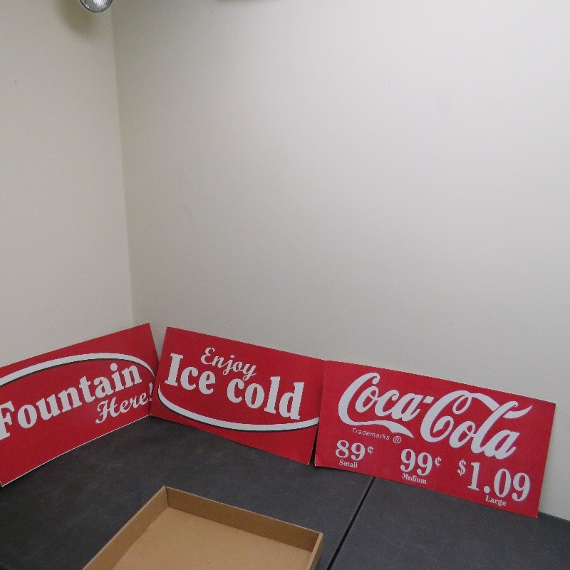 lot 96 image: Coca-Cola signs