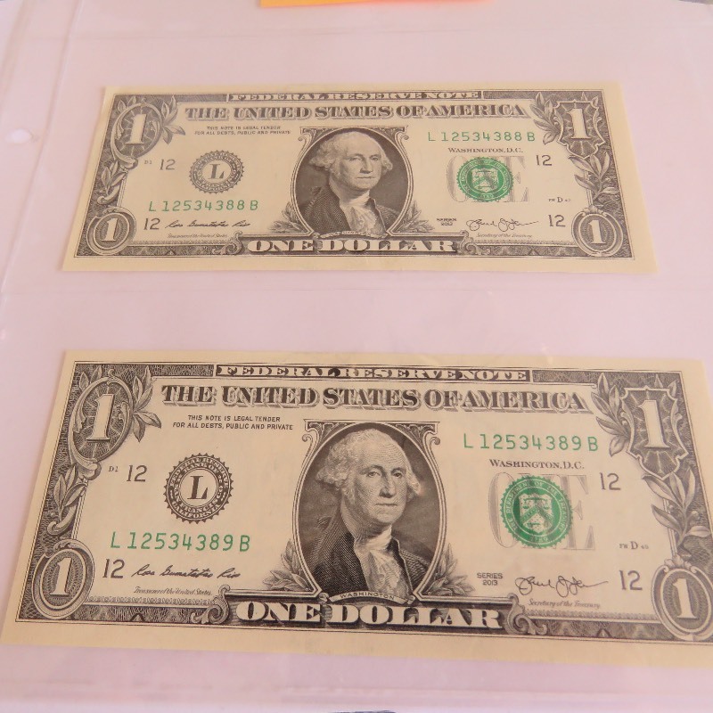 lot 266 image: $1.00 Bills in numerical order