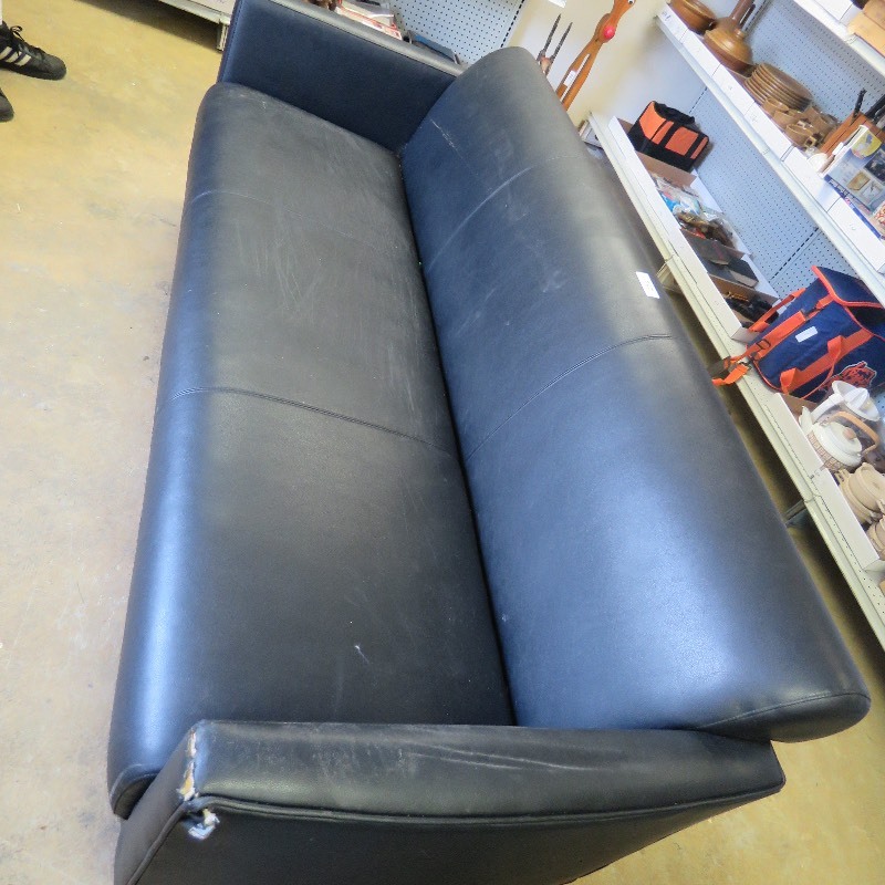 lot 296 image: Black sofa