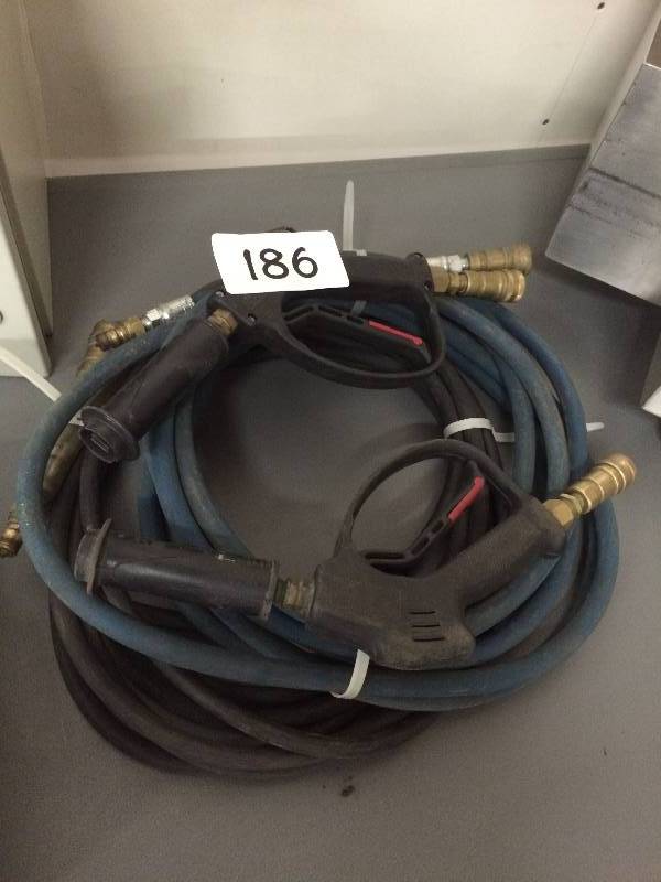 2 spray guns and hoses