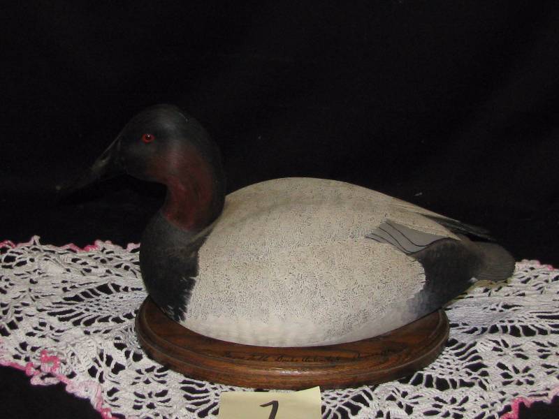 lot 1 image: 1980 John House Hand Carved Canvasback