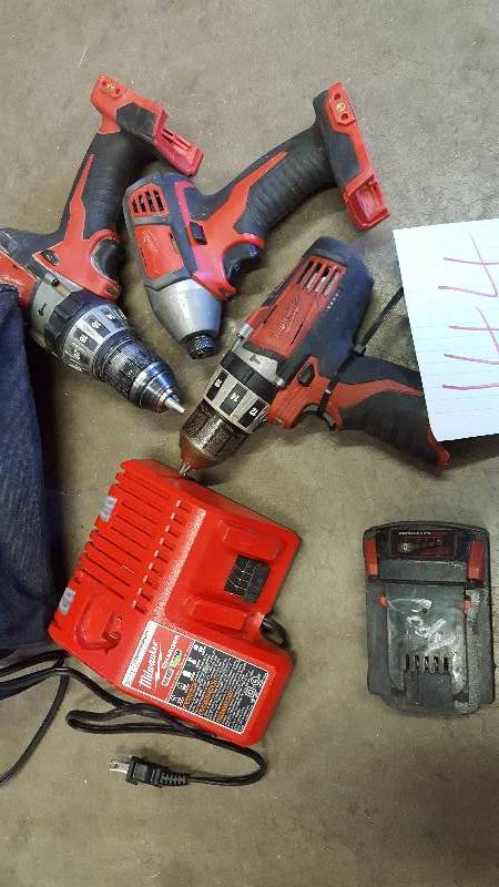 lot 144 image: Lot of Assorted Milwaukee M18 tools in working condition one battery and 1 charger and 1 bag included