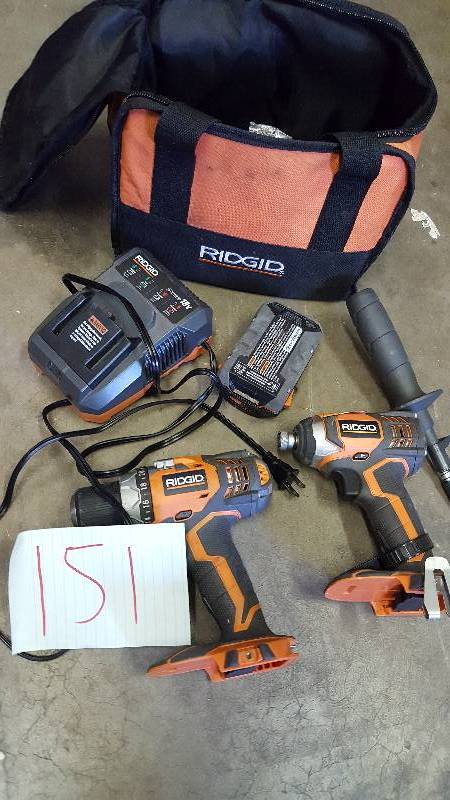 lot 151 image: Ridgid 18 volt Drill and impact driver plus 1 battery a charger in good working condition
