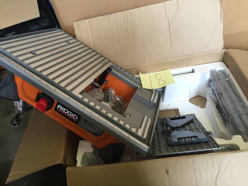 lot 18 image: RIDGID 7 in. Tile Saw with Stand new