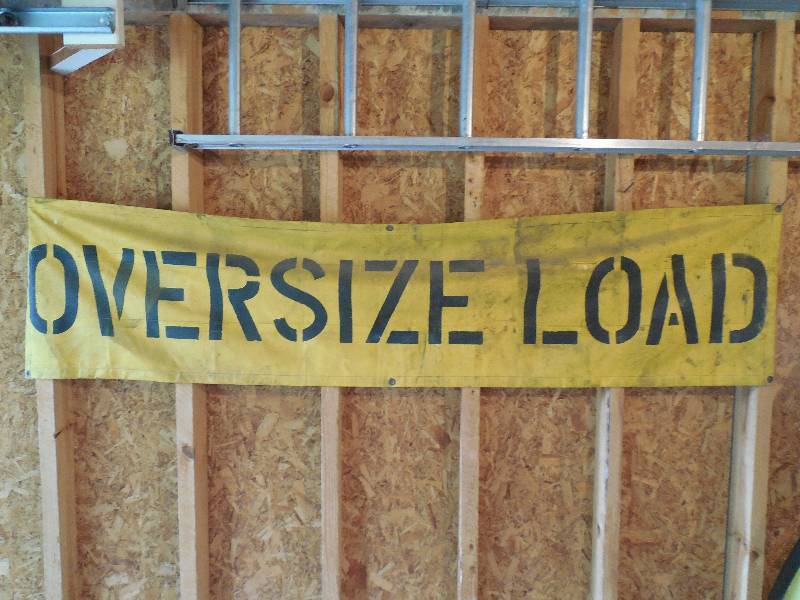 lot 13 image: 2 OVERSIZE LOAD BANNER SIGNS