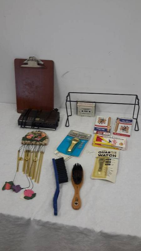 Wind chime, clock radio, clipboard, watches, brushes, and more