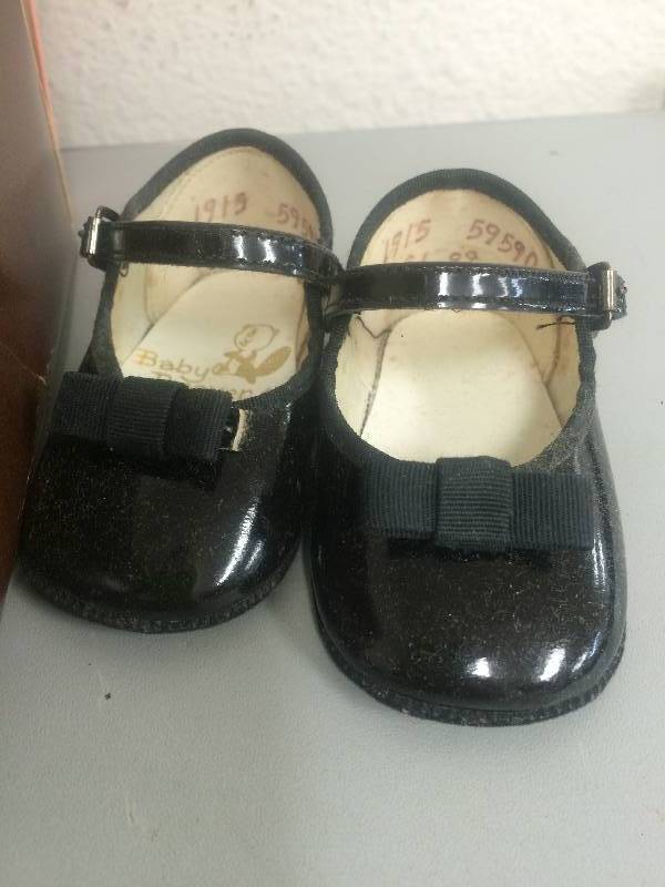 lot 35 image: Vintage Baby Beaver Shoes