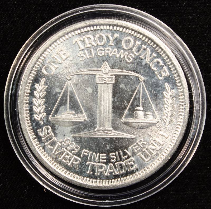 1 TROY OZ. .999 FINE SILVER 1984 MORGAN DOLLAR DESIGN IN AIRTITE HOLDER