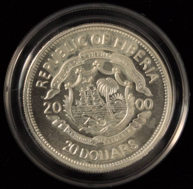 1 TROY OZ. .999 FINE SILVER YEAR 2000 MILLENNIUM LIBERIA $20 COLORIZED IN AIRTITE HOLDER