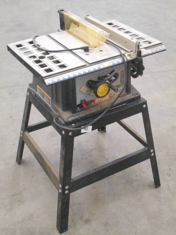 lot 39 image: Ryobi 10 Table Saw With Stand, Com...