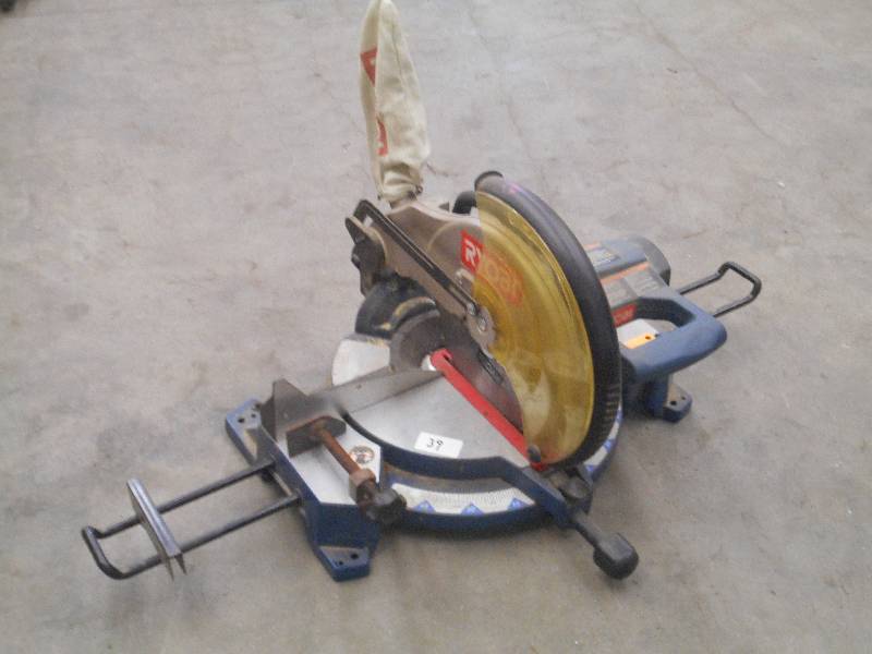 lot 40 image: Ryobi Miter Saw With Dust Bag, Work...