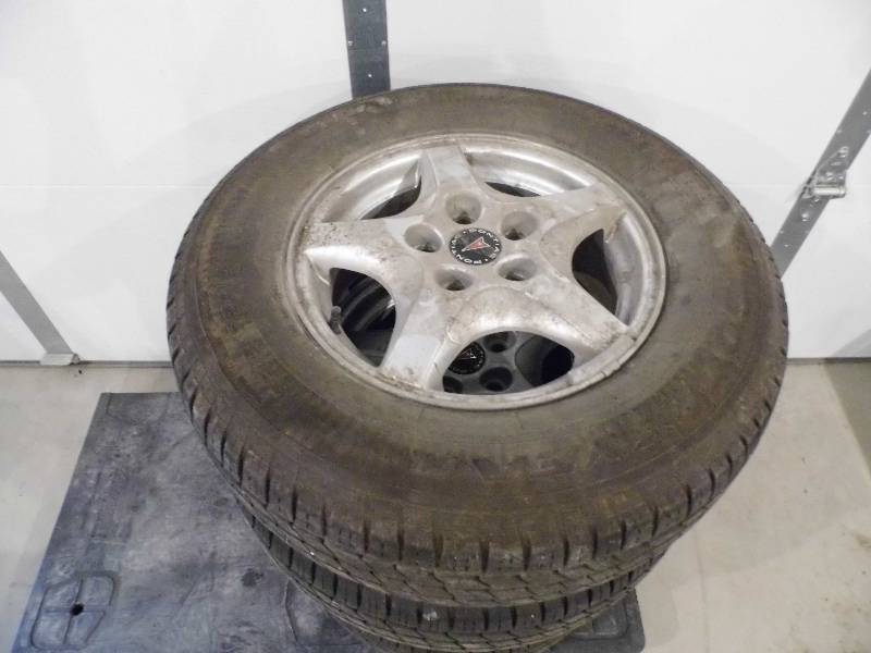 4 Goodyear Tires and Pontiac Rims