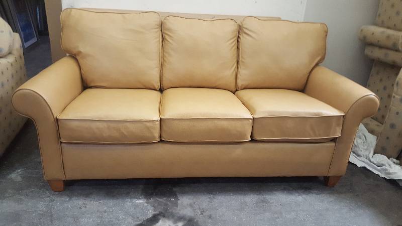 lot 2 image: Sleeper Sofa. Made by Flexsteel, Westside Collecton.Current model. Tan Leather.
