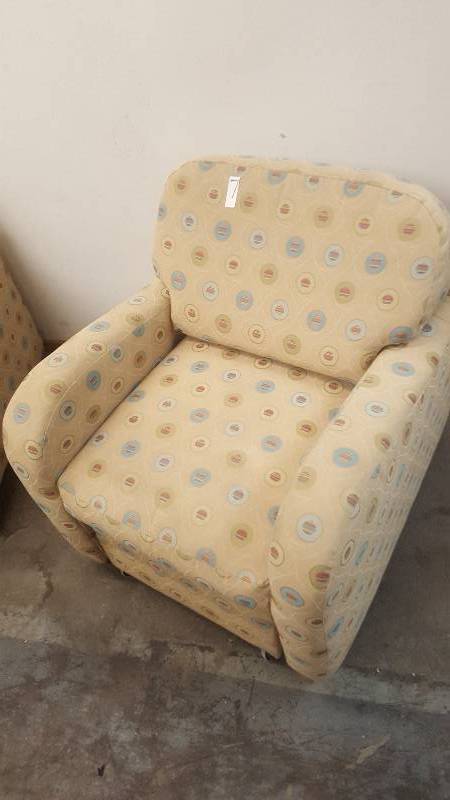 lot 7 image: Arm Chair with Roll under Ottoman. By Flexsteel. Cool and Unique design.