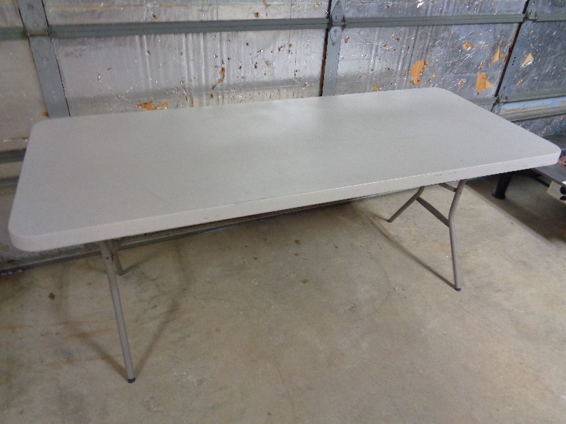 lot 27 image: 6 Ft Plastic Folding Table