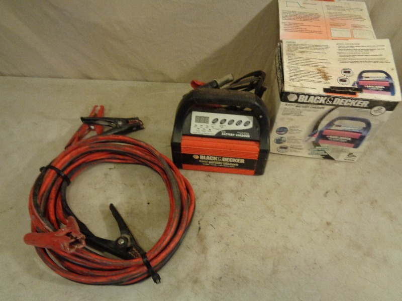 lot 128 image: Battery Charger and Jumper Cables