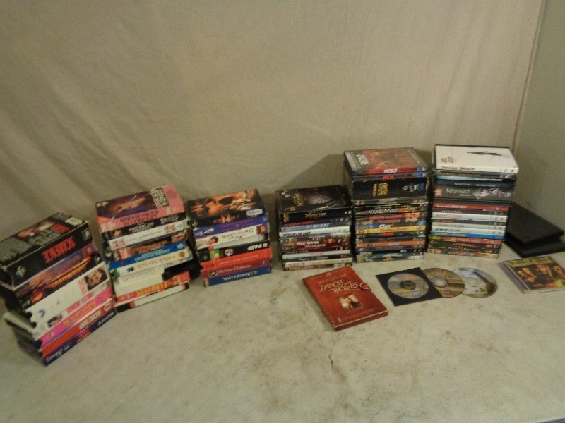 lot 141 image: Large Lot of DVDs and VHS Tapes