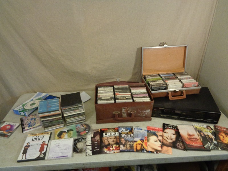 lot 231 image: Pioneer 6 Disc CD Player, Dvds, CDs, and 2 Cases of Cassettes