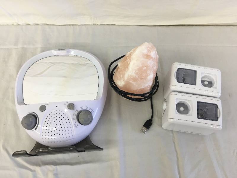 lot 31 image: usb salt lamp, shower radio, two  air-o-swiss personal humidifiers