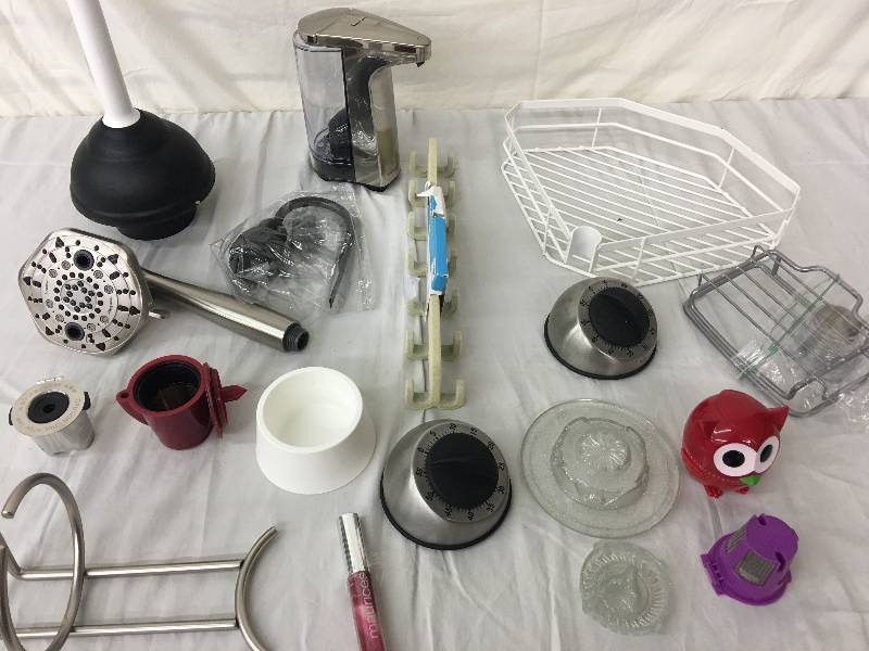 lot 132 image: plunger, timers, bathroom items
