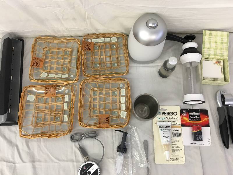 lot 225 image: candle holders, humidifier and cookie press