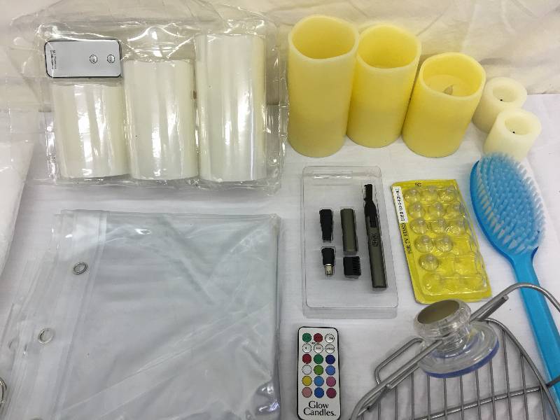 lot 303 image: flameless candles and shower items