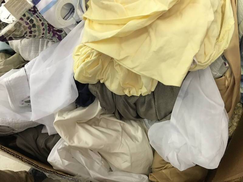 lot 428 image: Large gaylord of new sheets and curtains and bed sets  they just need to be sorted  these are new