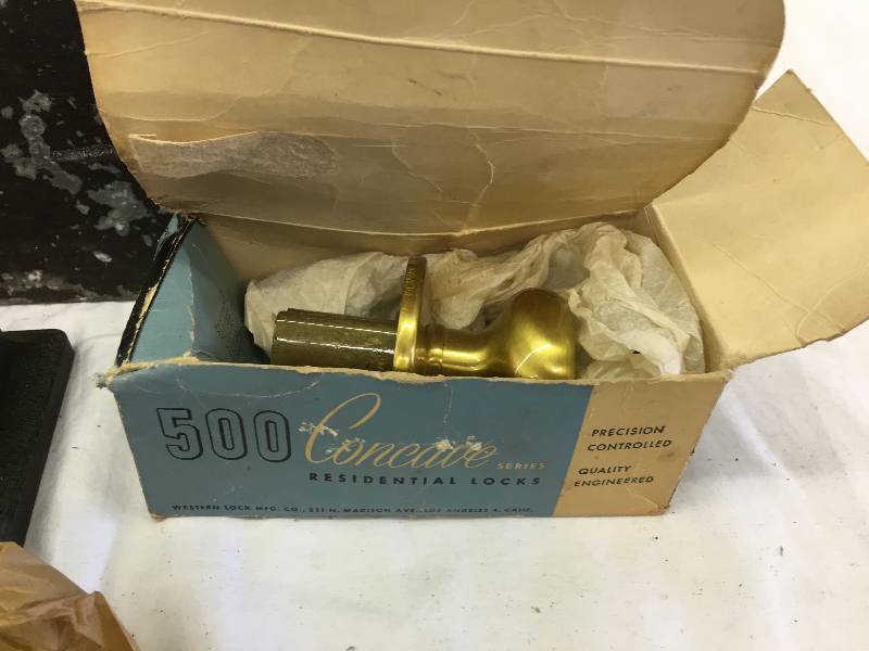 lot 457 image: tool box full of cabinet knobs and door knobs