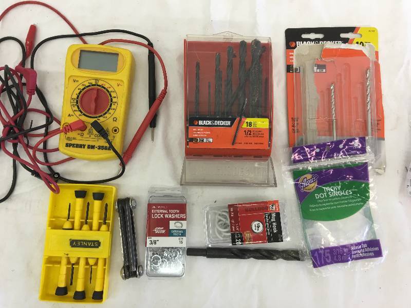 lot 477 image: drill bits and allen wrenches and voltage tester