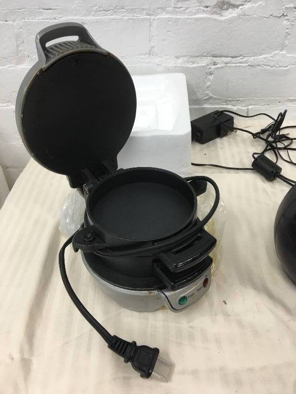 lot 545 image: iHome  Bluetooth Stereo FM Clock Radio and Speakerphone with USB Charging, hamilton Beach 25475A Breakfast Sandwich Maker retail $29.99